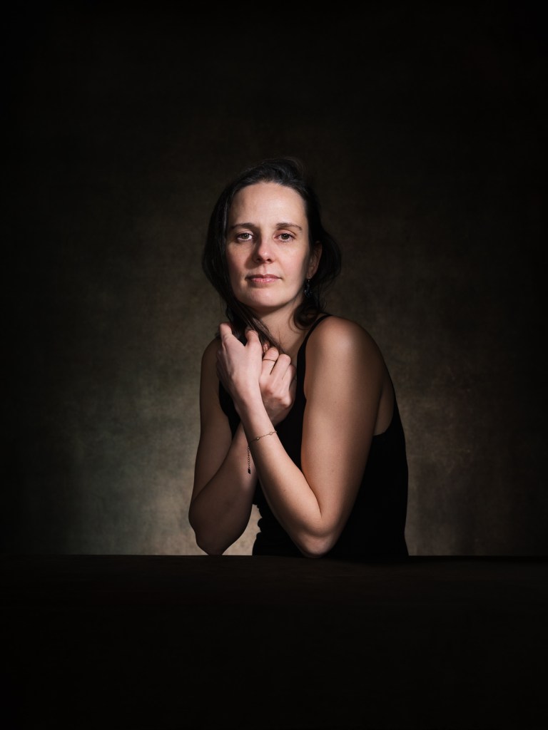 Professional fine art studio portrait of Julie by De Sheng Lim, a professional portrait photographer based in The Hague, Netherlands.