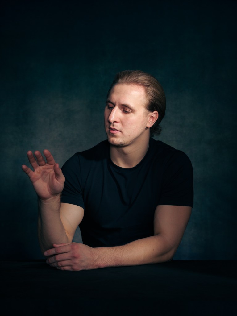 Fine art studio portrait of Pavel Gubskii by De Sheng Lim, a professional portrait photographer based in The Hague, Netherlands.