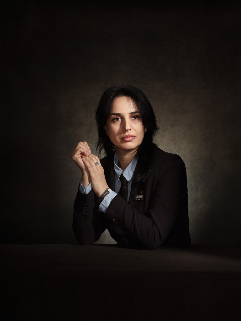A fine art studio portrait of Lala Abgaryan, Armenian human rights advocate and victim representative, for the "Survivors in Defence of ICC" project in The Hague, Netherlands, photographed by De Sheng Lim.