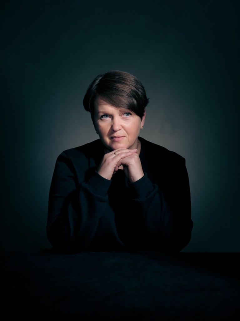 A fine art studio portrait of Olena Yahupova, a Ukrainian advocate for the Portraits for Reparation project, photographed in The Hague, Netherlands by portrait photographer De Sheng Lim.